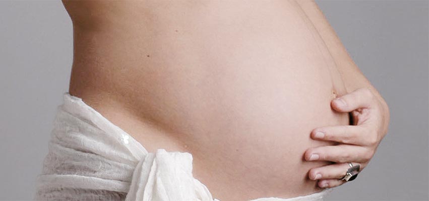 Schwangerschafts- und Babybauchfotografie bei MOMENTS Berlin